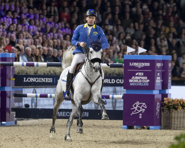 Os alemães Christian Ahlmann e Clintrexo Z conquistaram uma emocionante vitória na nona rodada da Copa dos Campeões da Europa Longines FEI Jumping 2018/2019 no Nekkerhal Stadium em Mechelen, Bélgica. (FEI / Dirk Caremans)
